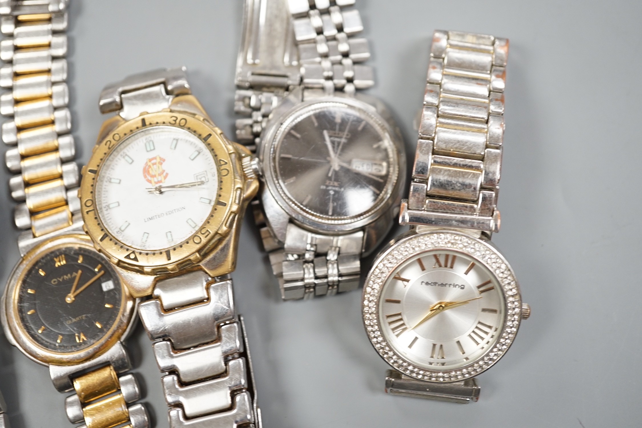 Six assorted gentleman's modern wrist watches including Seiko, Tissot and Cyma.